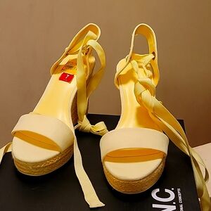 Soft yellow wedge sandal
